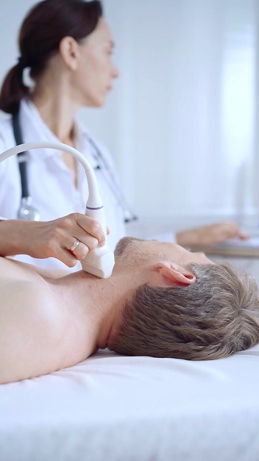 Doctmetroplex medical center imagingor woman performing neck ultrasound exam on male patient. Medicine service concept metroplex medical center imaging